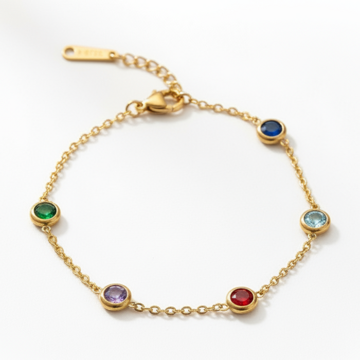 Celeste Rainbow Dot Bracelet in gold PVD-plated finish, product shot on white background