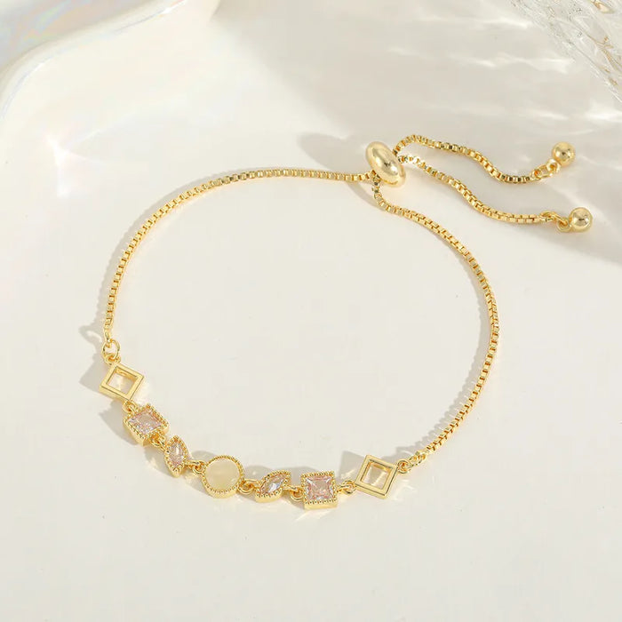 Amara Geo Charm Bracelet in 18K gold PVD-plated finish, product shot on white background
