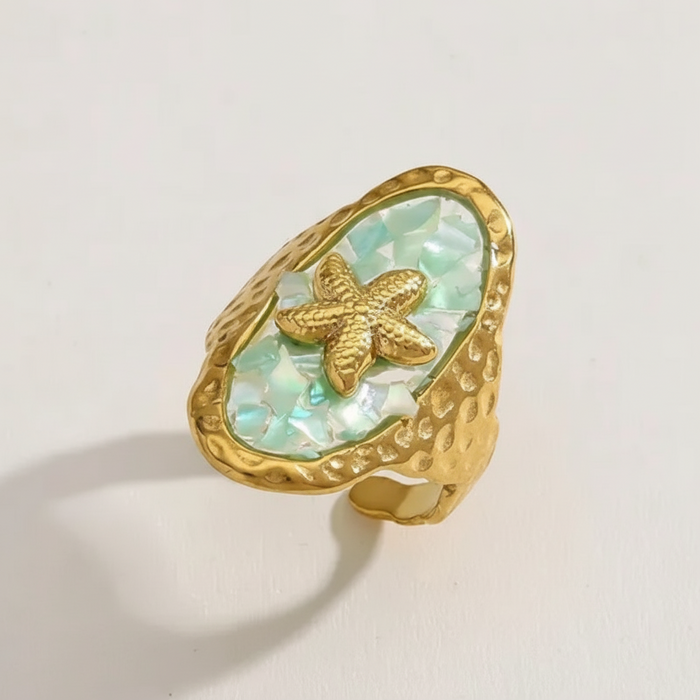 Aria Opal Starfish Ring in 18K gold PVD-plated finish, product shot on white background