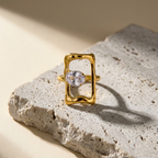 Elena Frame Open Ring, styled flat lay