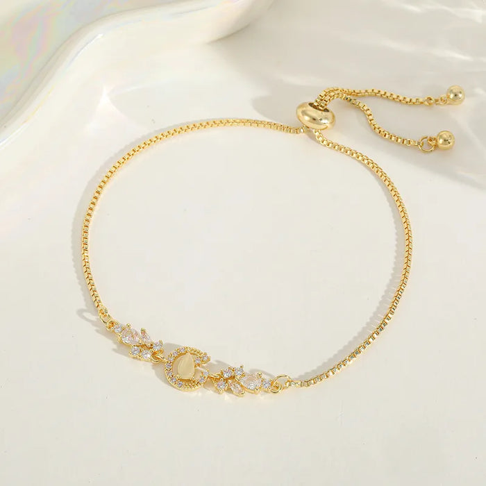Luna Rose Charm Bracelet in 18K gold PVD-plated finish, product shot on white background
