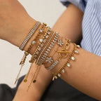 Aurelia Oval Tennis Bracelet in 18K gold PVD-plated finish worn on the wrist