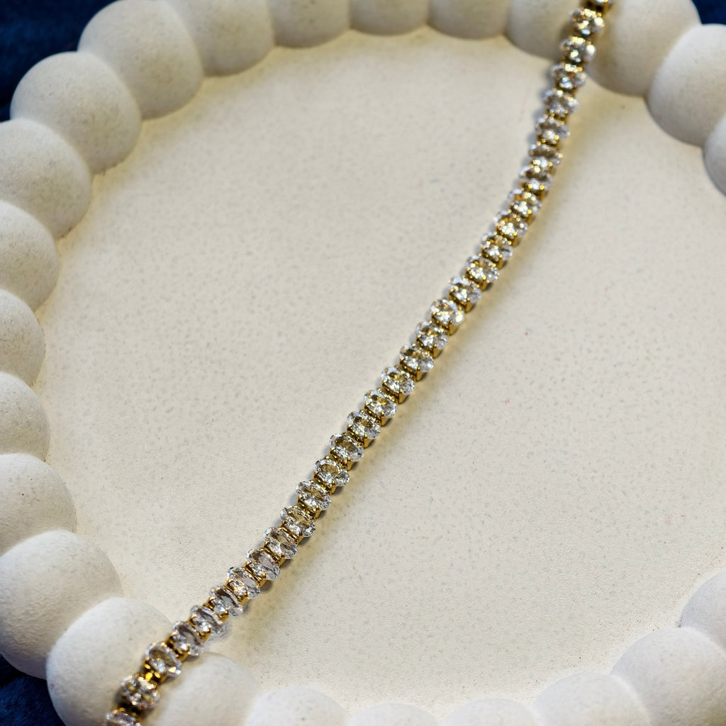Aurelia Oval Tennis Bracelet, styled flat lay