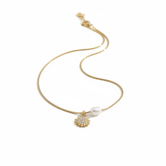 Solara Pearl Sunburst Pendant Necklace in 18K gold PVD-plated finish, product shot on white background