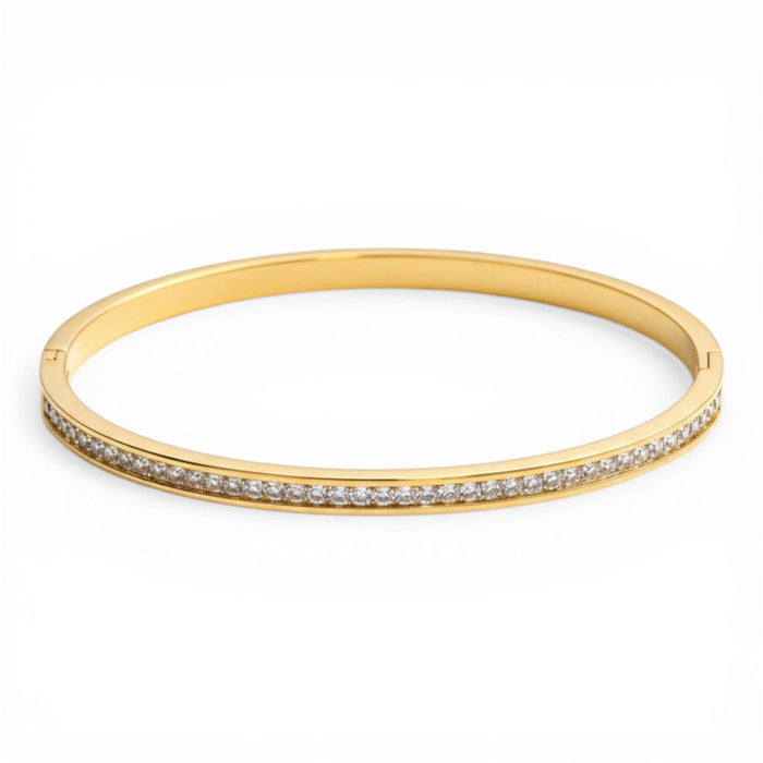 Celeste Eternity Line Bangle in 18K gold PVD-plated finish, product shot on white background