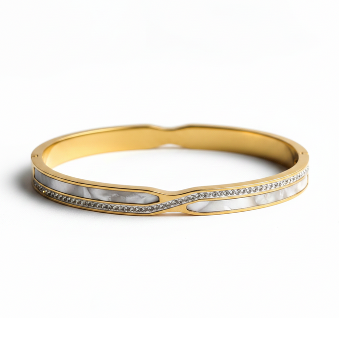 Elena WaveGlow Bangle in 18K gold PVD-plated finish, product shot on white background