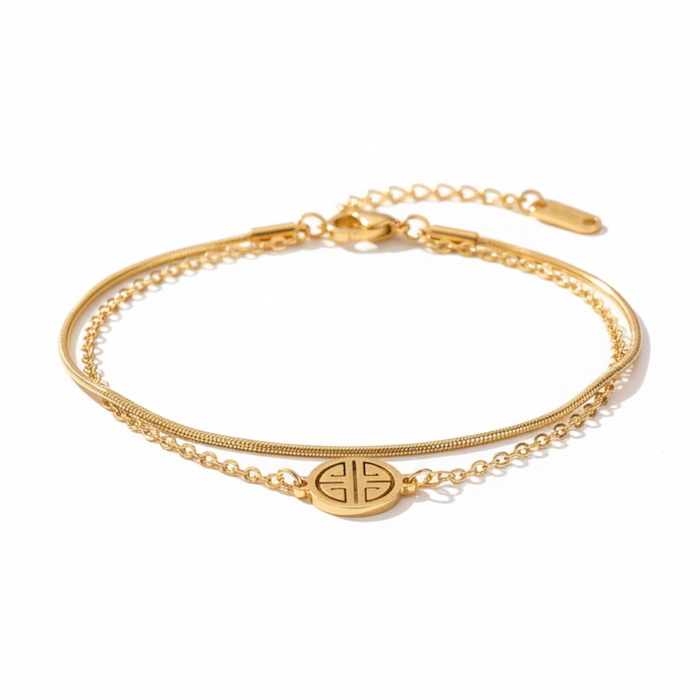 Serene Emblem Double Chain Bracelet in gold PVD-plated finish, product shot on white background