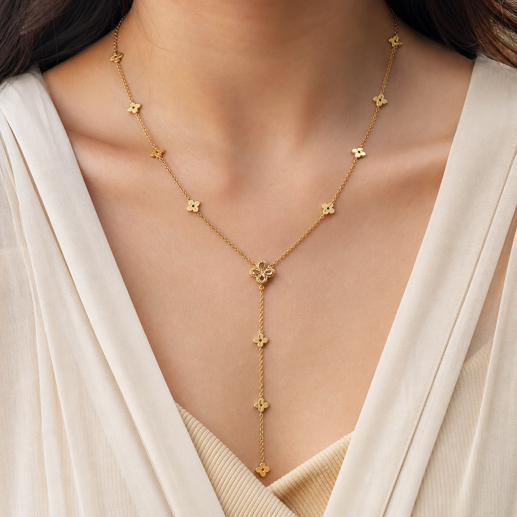 Four Leaf Glow Y-Necklace in 18K gold-plated finish worn on the neck