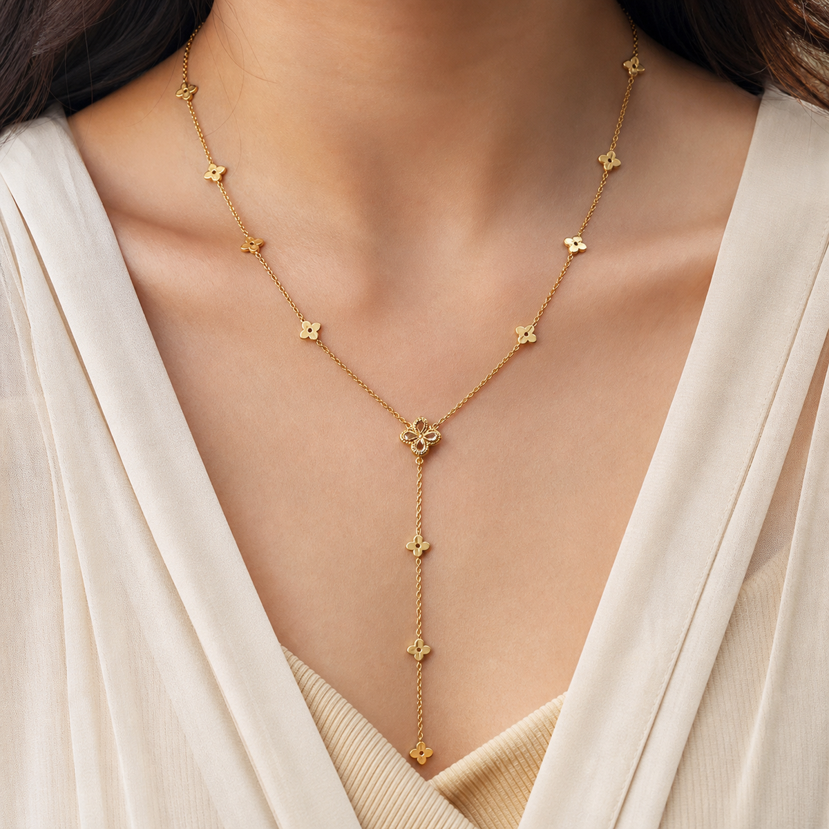 Four Leaf Glow Y-Necklace in 18K gold-plated finish worn on the neck