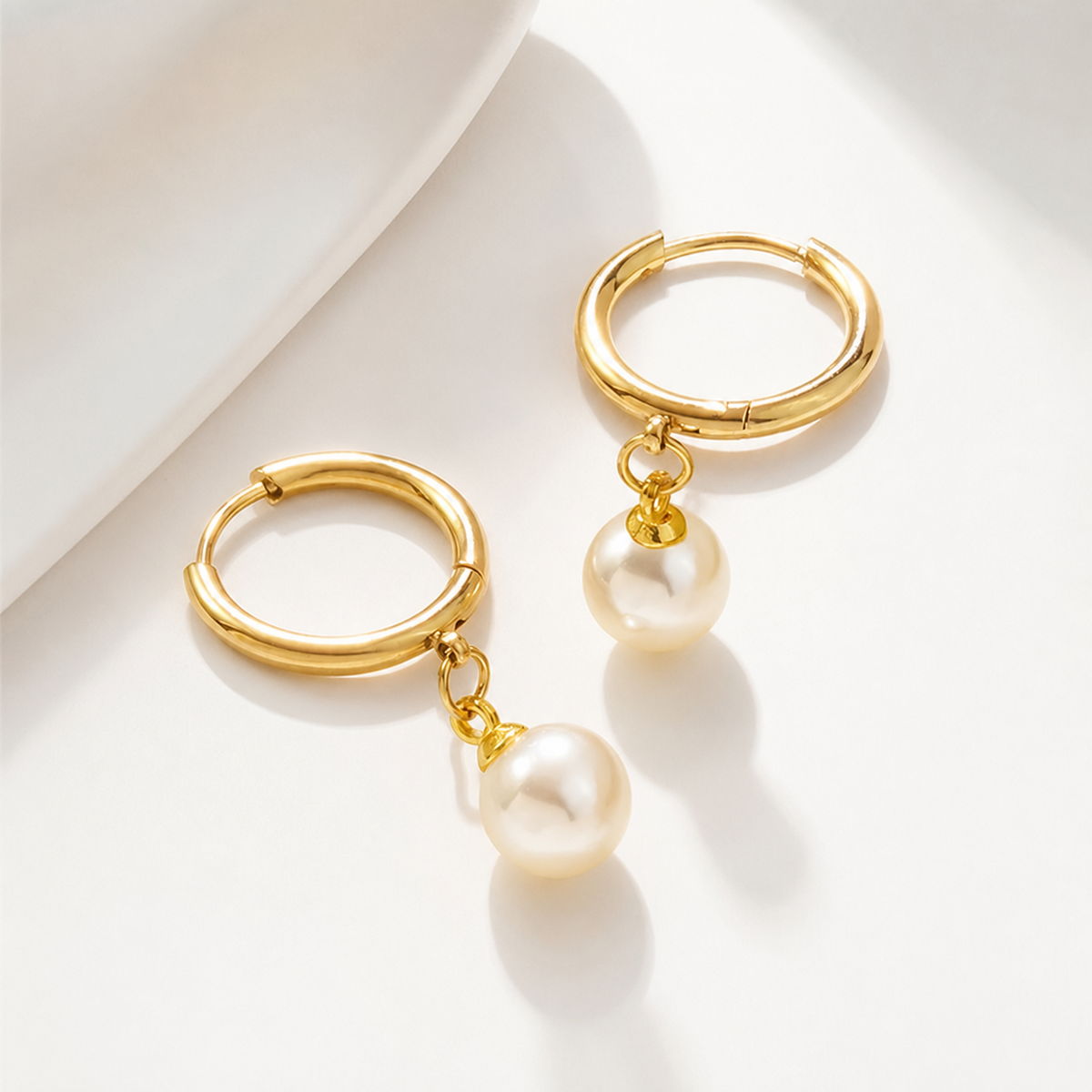 Noelle Pearl Drop Hoop Earrings in 18K gold-plated finish, product shot on white background