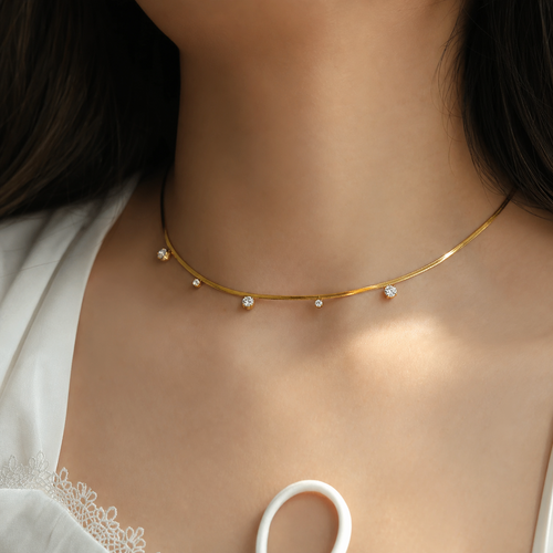 Amelia Multi Charms Zircon Necklace in 18K gold PVD-plated finish worn on the neck
