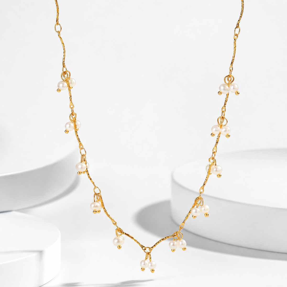 Olivia Pearl Necklace in 18K gold PVD-plated finish, product shot on white background