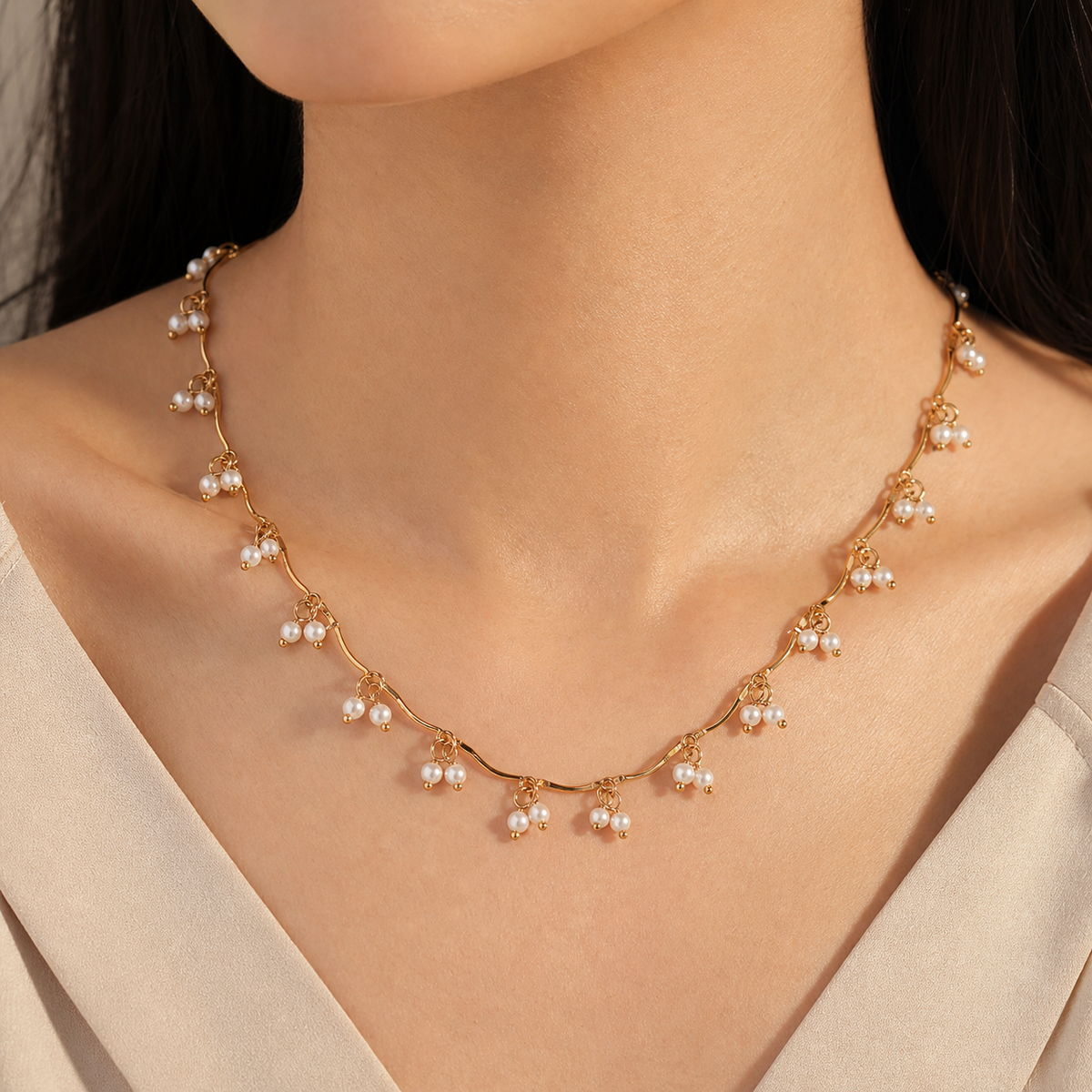 Olivia Pearl Necklace in 18K gold PVD-plated finish worn on the neck