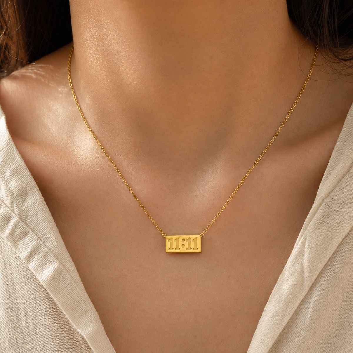 11:11 Gold Bar Necklace in 18K gold PVD-plated finish worn on the neck