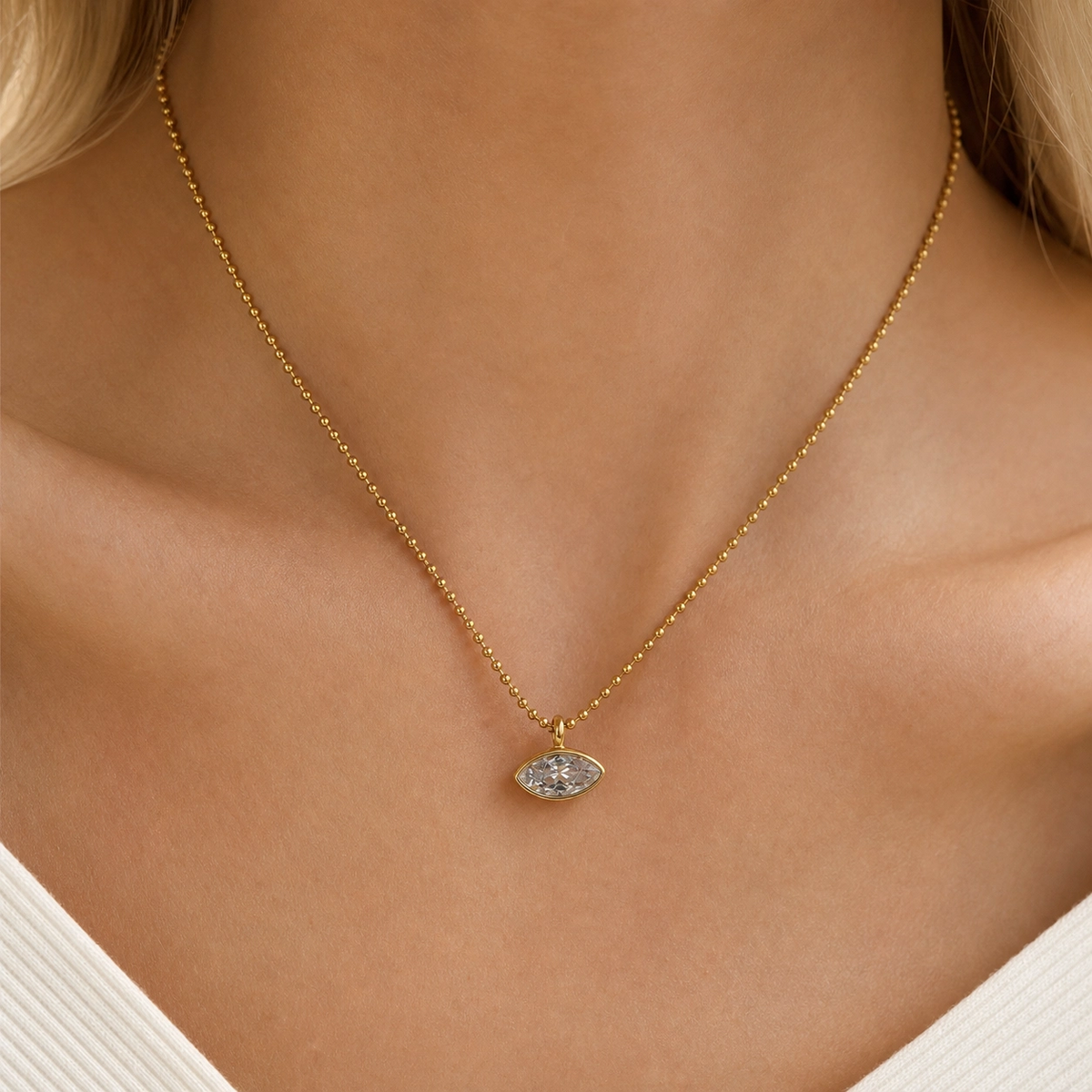 Iris Horse Eye Necklace in 18K gold PVD-plated finish worn on the neck