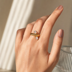 Luna Twisted Open Ring in 18K gold PVD-plated finish worn on the hand
