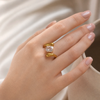 Iris Open Ring in 18K gold PVD-plated finish worn on the hand