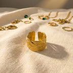 Sofia Braid Open Ring, styled flat lay