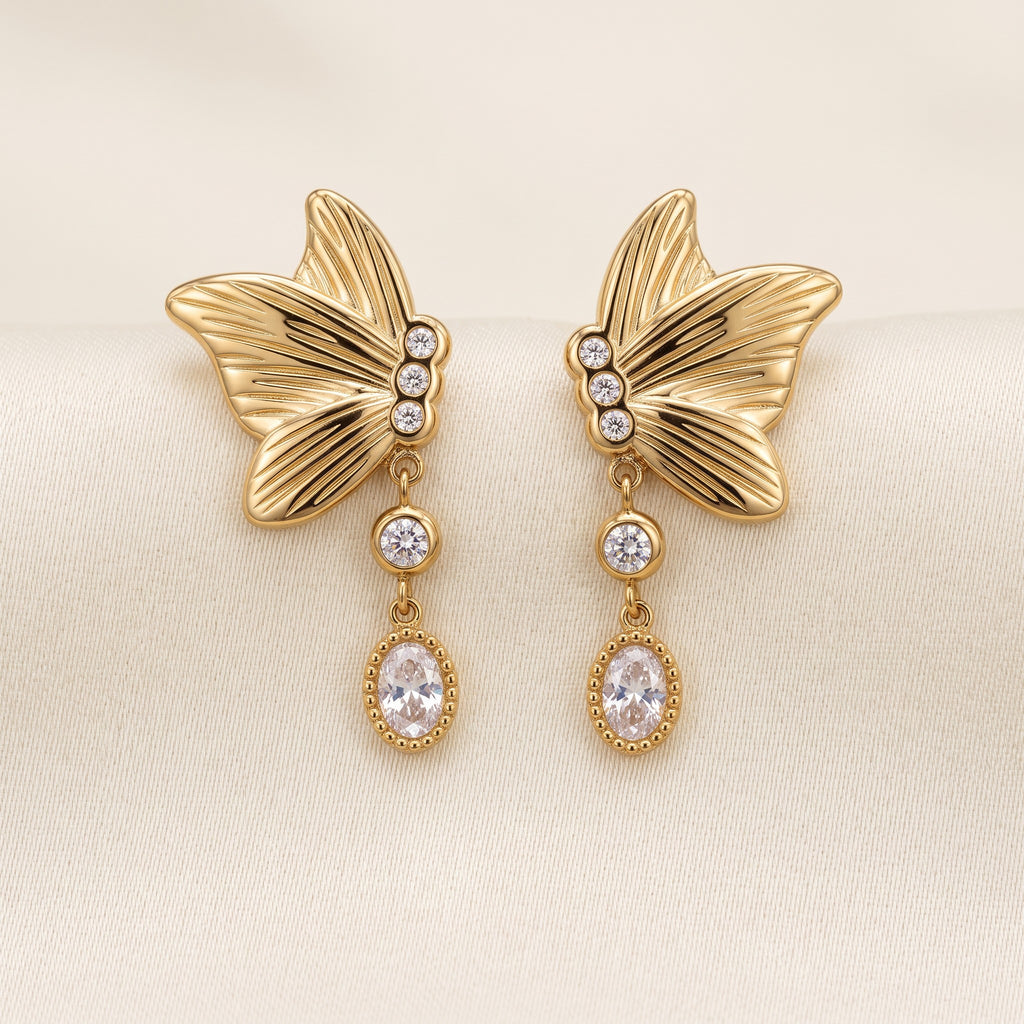 Noa Butterfly Earrings, styled flat lay