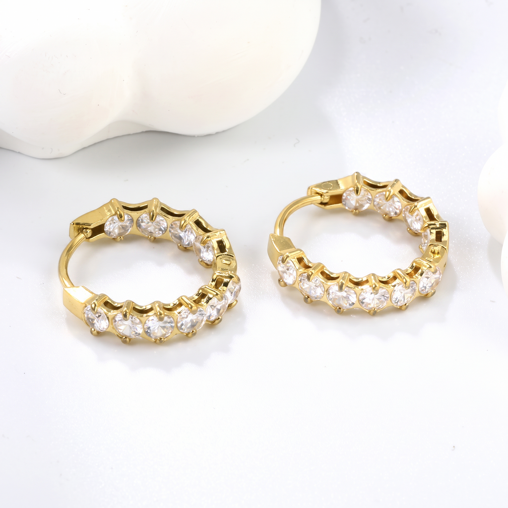 Lyra Crystal Hoop Clips, styled flat lay