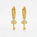 Meher Crystal Key Drop Earrings in 18K gold PVD-plated finish, product shot on white background