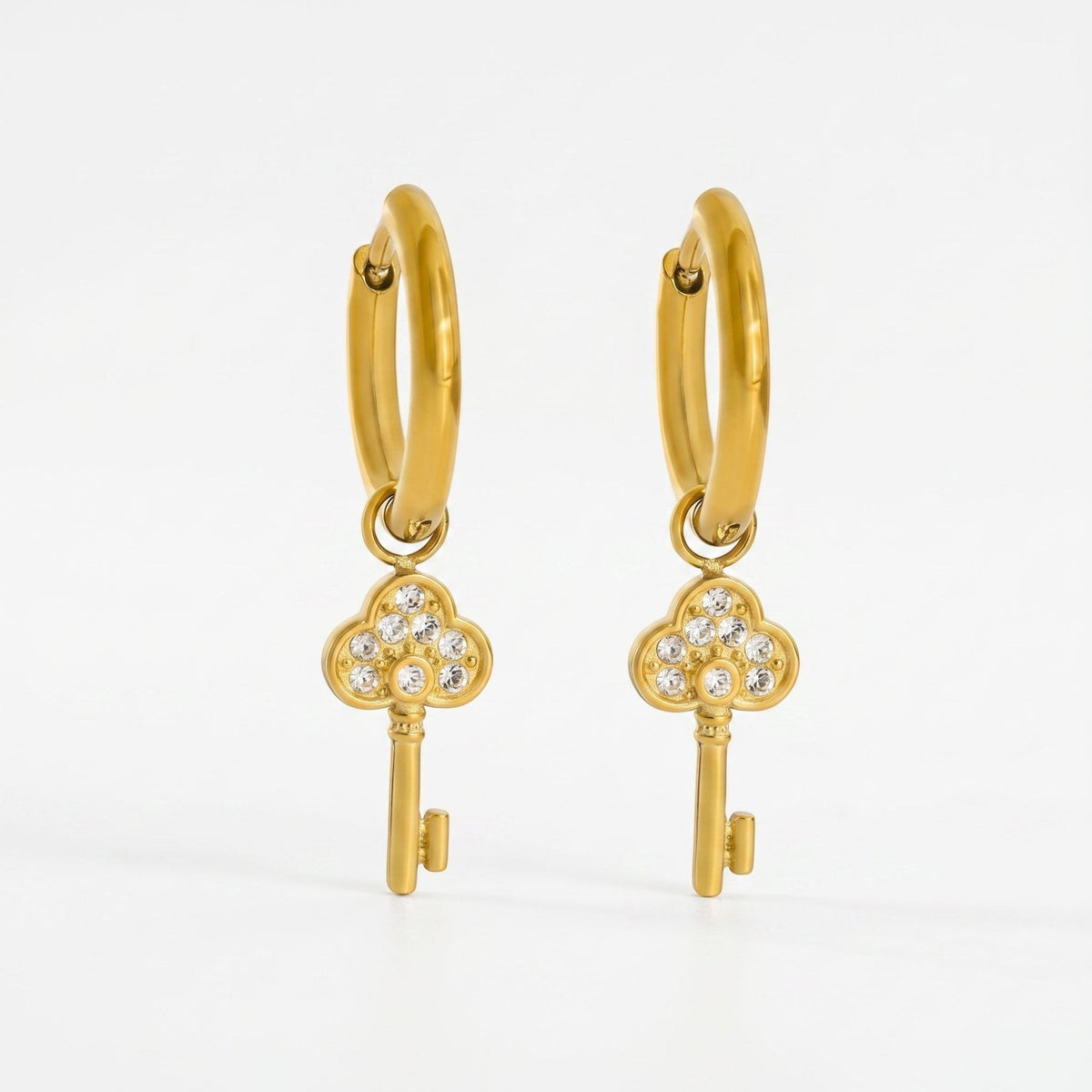 Meher Crystal Key Drop Earrings in 18K gold PVD-plated finish, product shot on white background