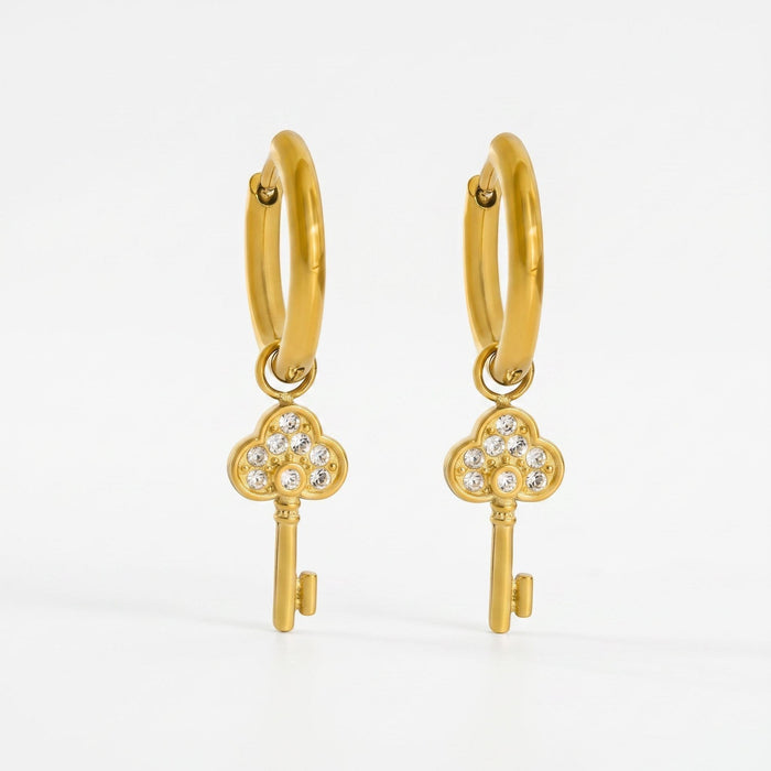 Meher Crystal Key Drop Earrings in 18K gold PVD-plated finish, product shot on white background