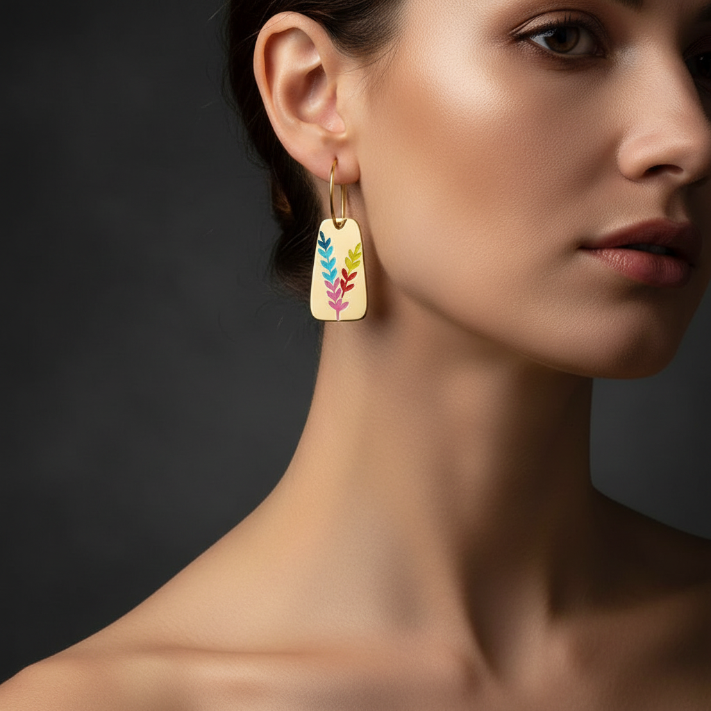 Aurora Color Leaf Earrings in 18K gold-plated finish worn on the ear