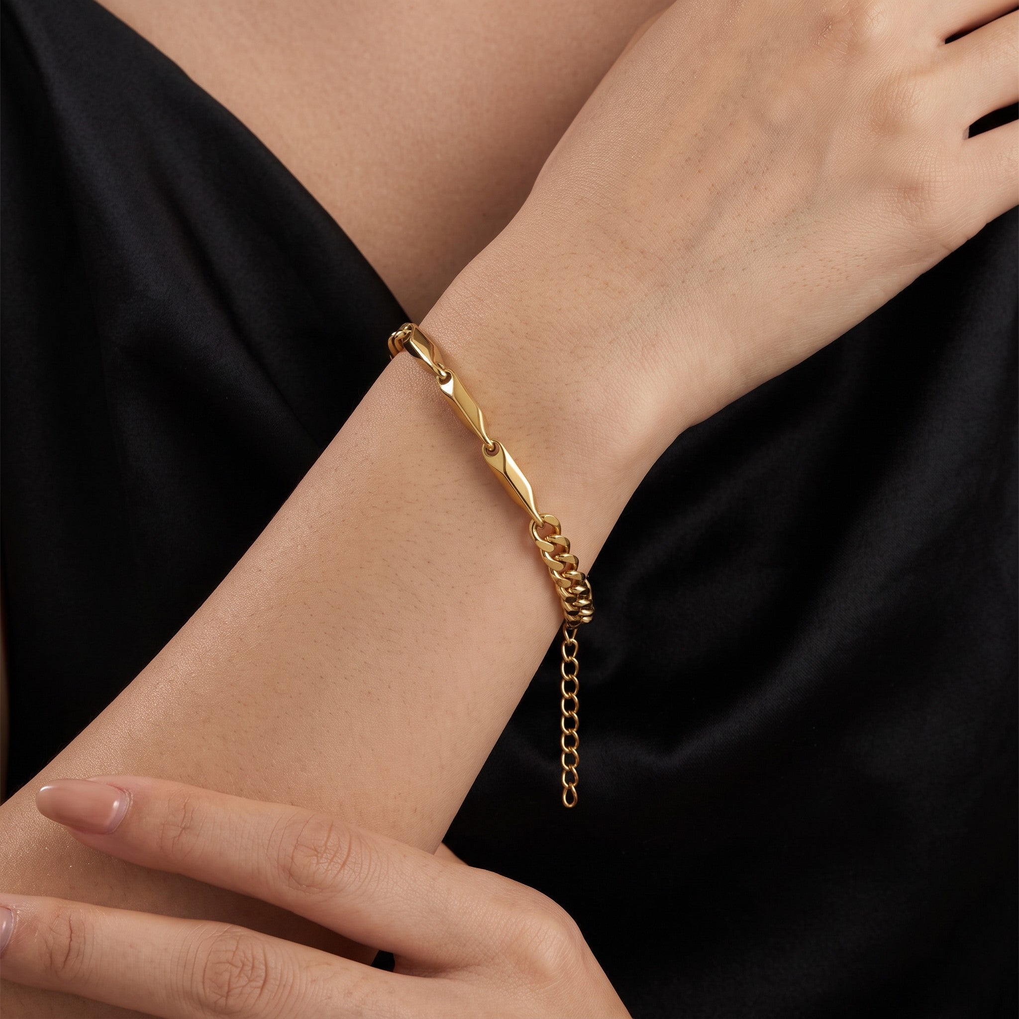 Pretty Shimmering Things Global gold-tone stainless steel bracelet featuring a mix of angular links and curb chain.