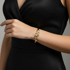Sola Bubble Luxe Bangle in 18K gold PVD-plated finish worn on the wrist