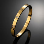 Stella Vintage Sparkle Bangle, styled flat lay