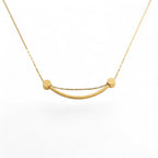 Smiley Curve Minimal Necklace in 18K gold-plated finish, product shot on white background