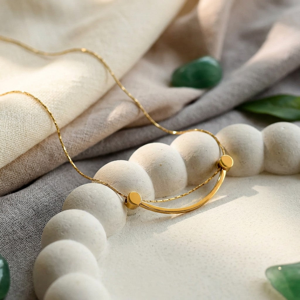 Smiley Curve Minimal Necklace, styled flat lay