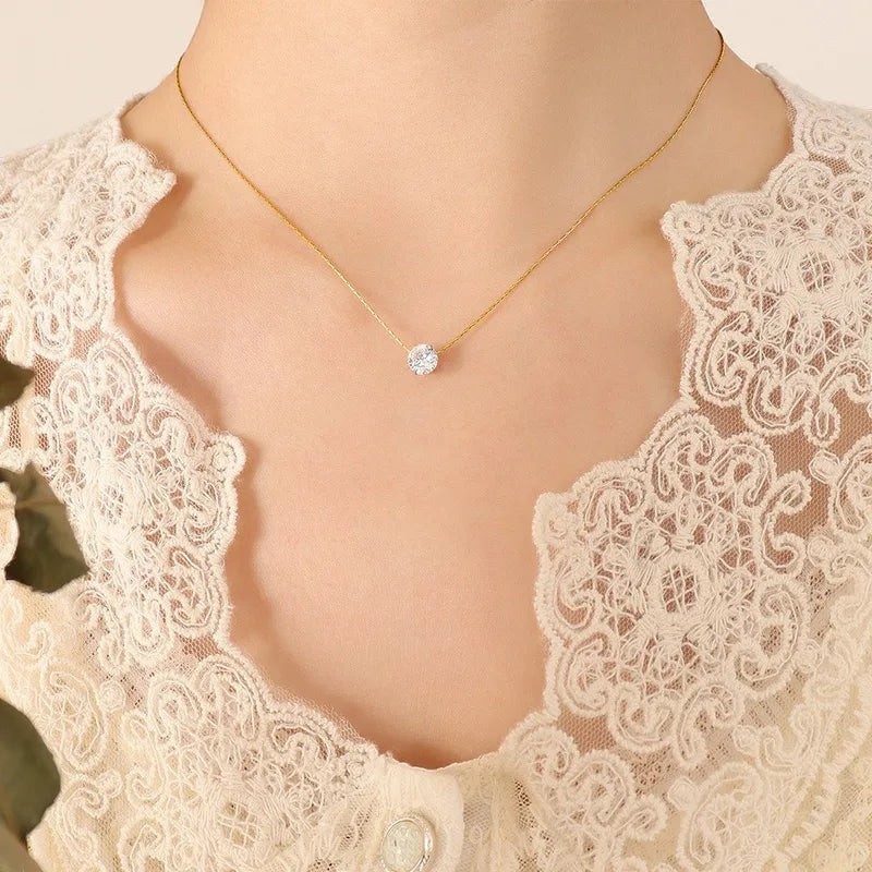 Solitaire Glow Promise Necklace in 18K gold PVD-plated finish worn on the neck
