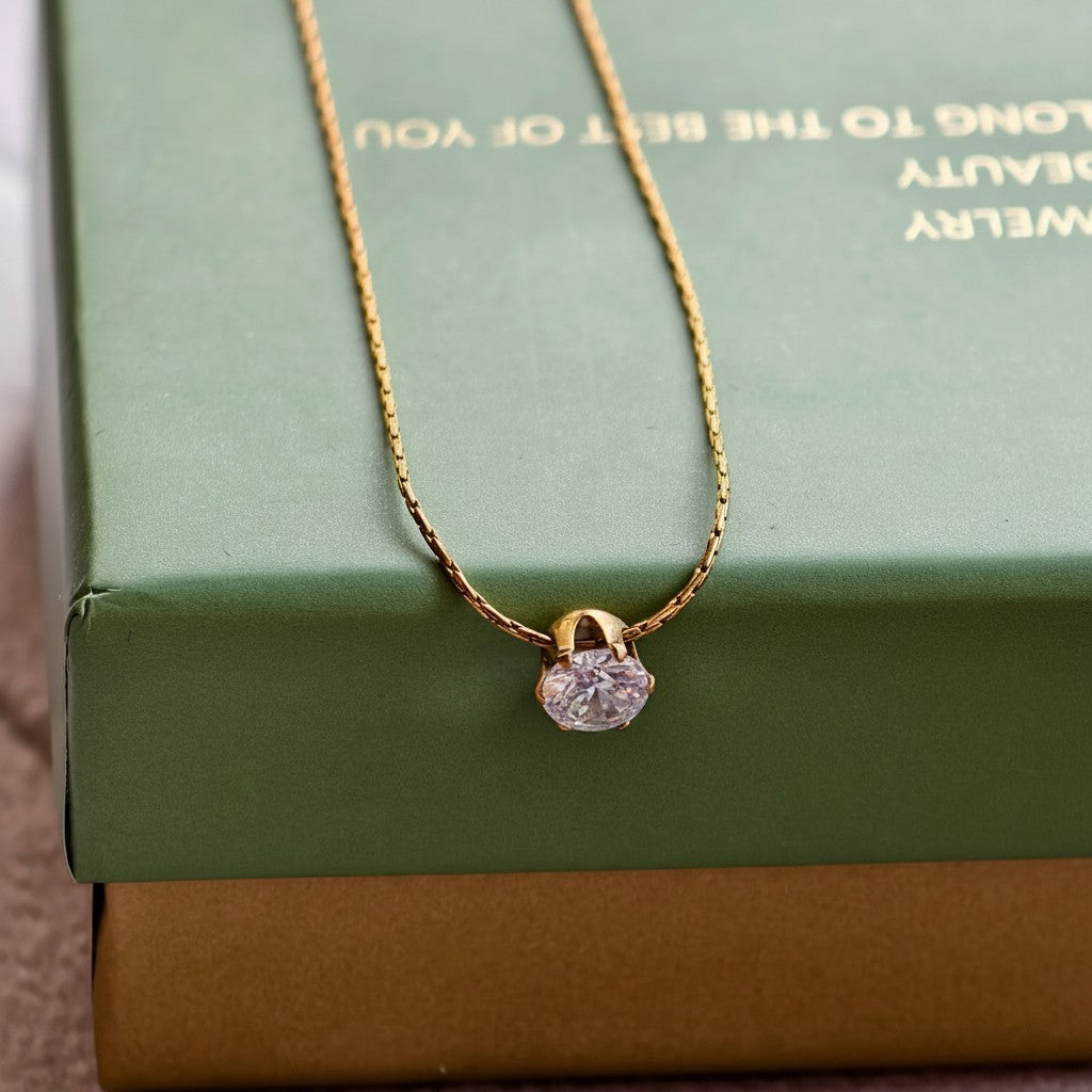 Solitaire Glow Promise Necklace, close-up on a display