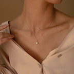 Stella Starry Layered Necklace in gold PVD-plated finish worn on the neck