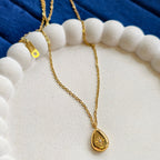 Stella Dewdrop Necklace, alternate angle on a display