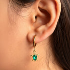 Marina Turtle Earrings in 18K gold PVD-plated finish worn on the ear