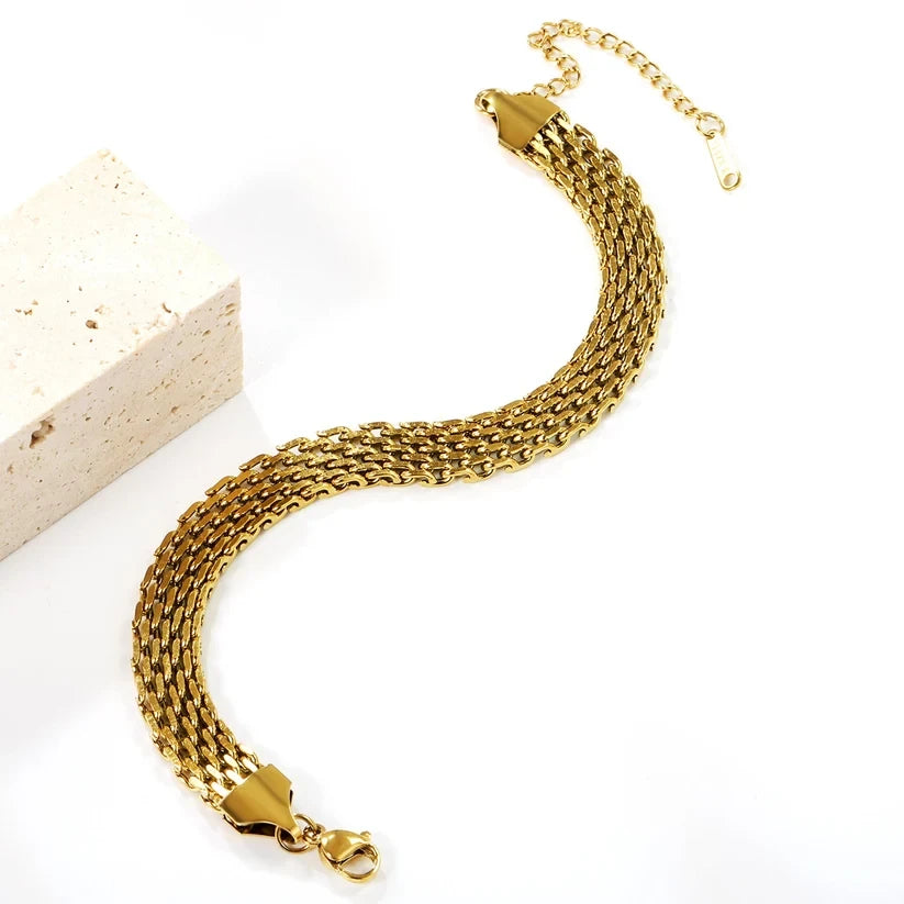 Elowen Multi-Strand Gold Bracelet, styled flat lay