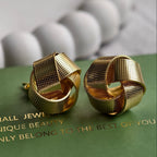 Nova Woven Knot Earrings shown with Pretty Shimmering Things packaging