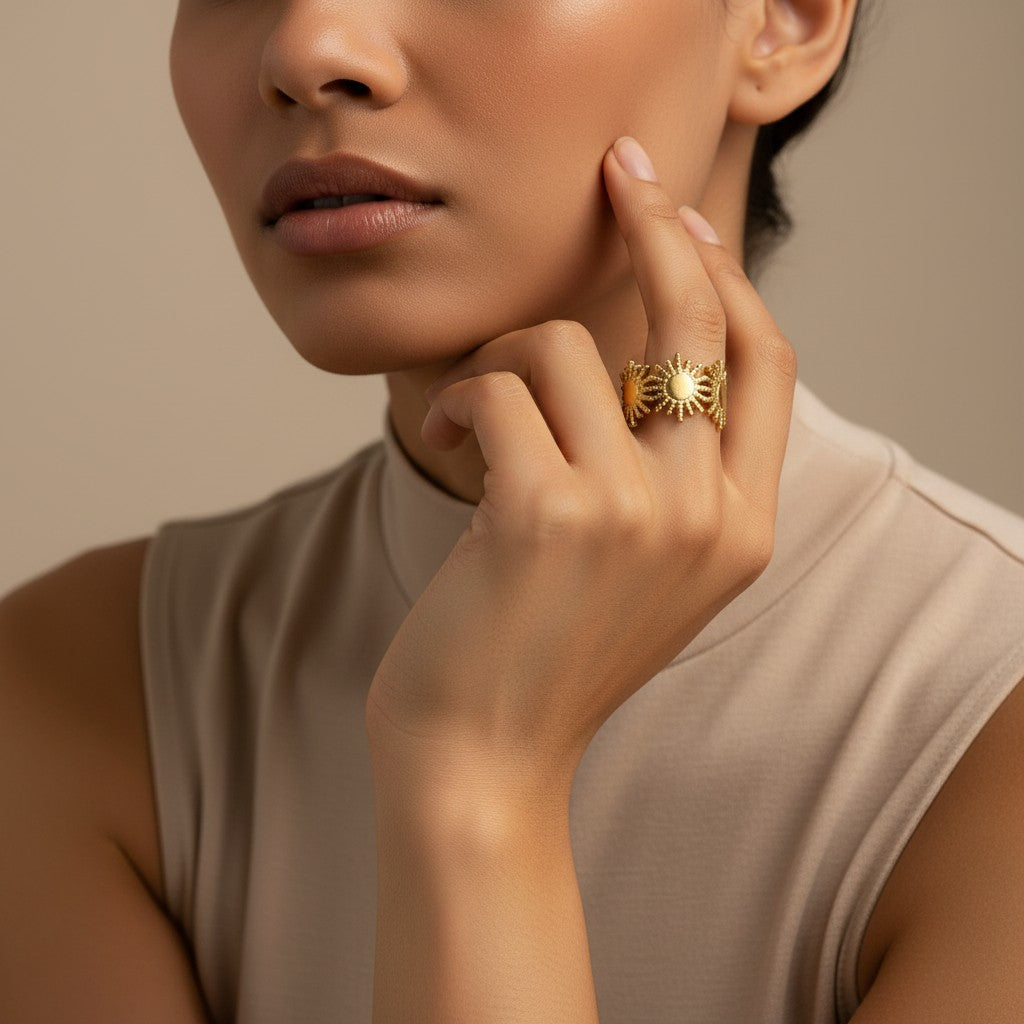 Solara Sunburst Ring in 18K gold PVD-plated finish worn on the hand