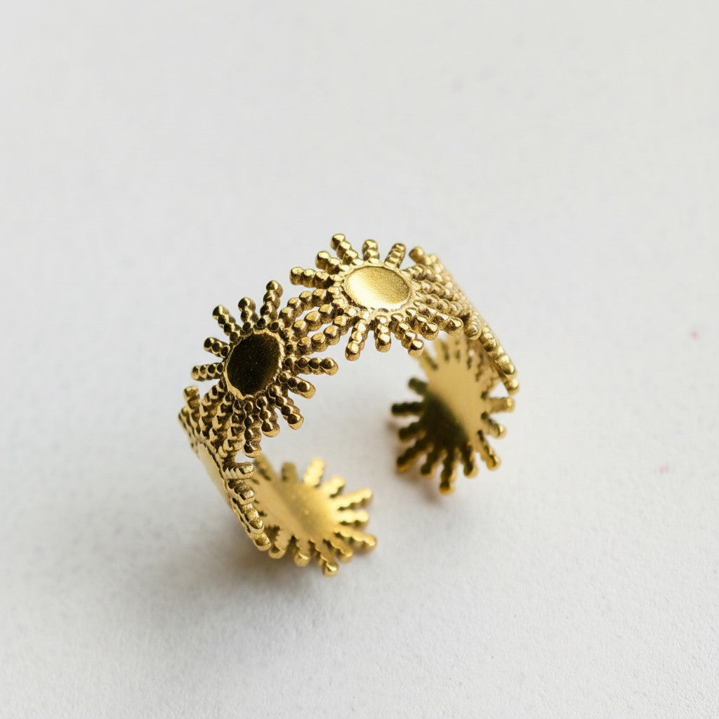 Solara Sunburst Ring in 18K gold PVD-plated finish, product shot on white background
