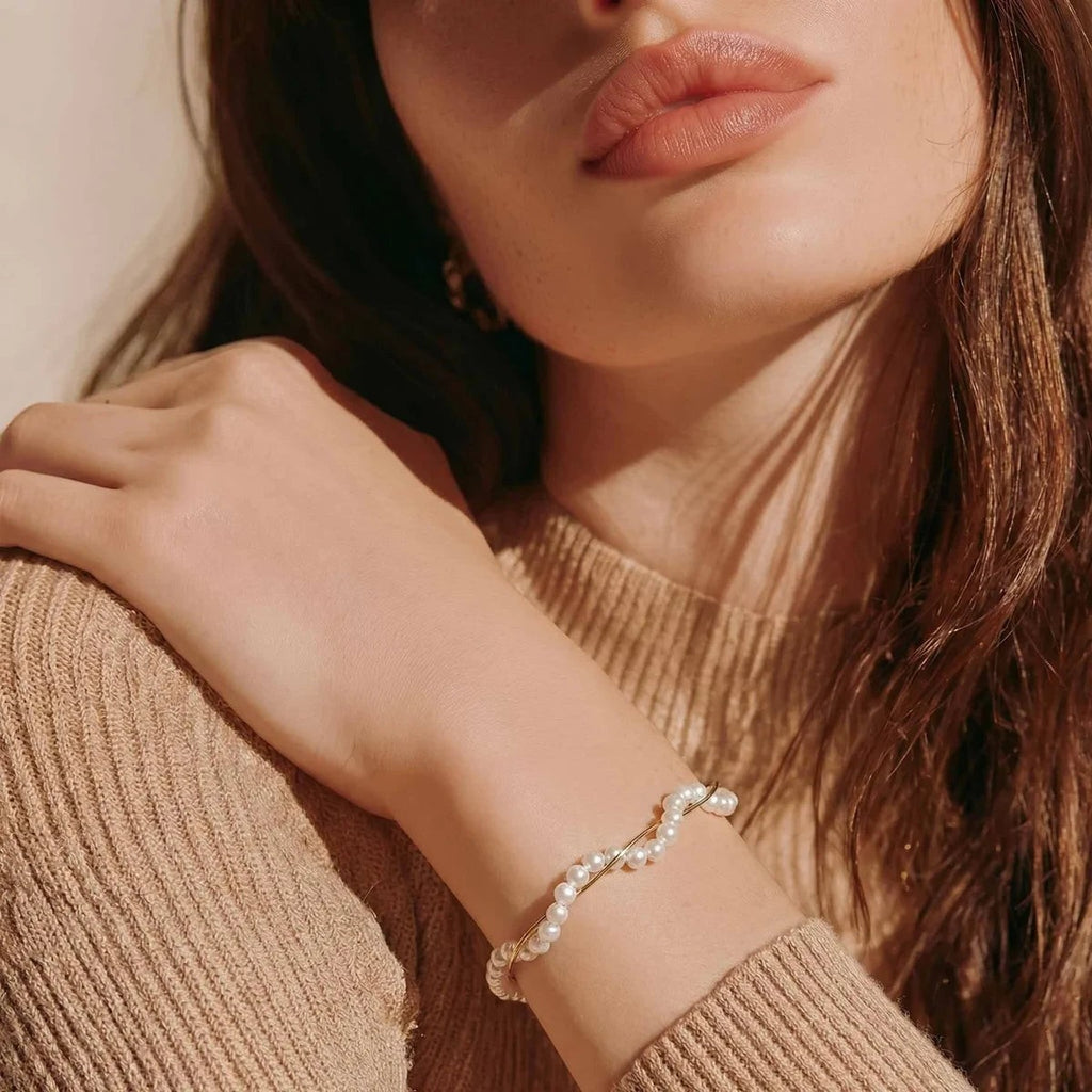 Madison Pearl Twist Bracelet in gold-tone finish worn on the wrist