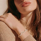 Madison Pearl Twist Bracelet in gold-tone finish worn on the wrist