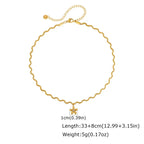 Pretty Shimmering Things gold-tone wavy chain necklace with a dainty matte floral pendant and central crystal accent.